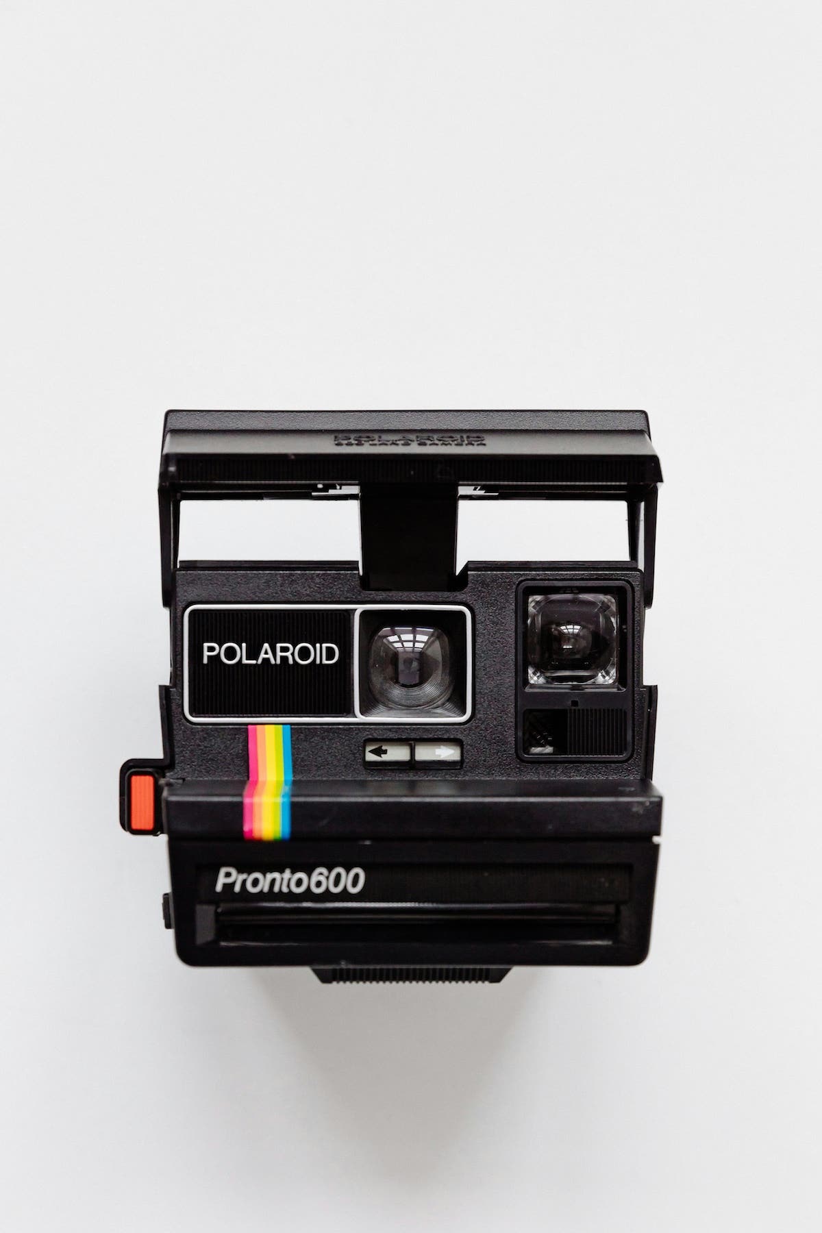 a front view of a vintage polaroid camera