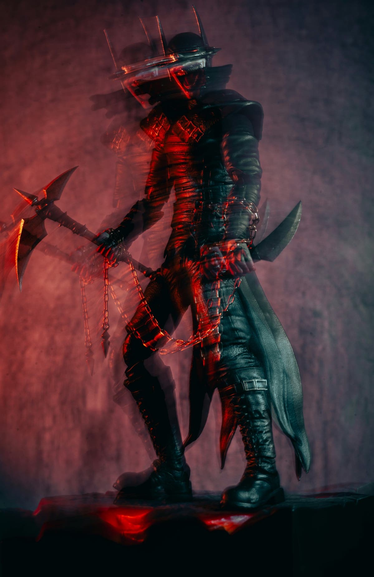 Cinematic image of a ninja-esque warrior with a spiked helmet, leather armor, and two knives connected by a chain.